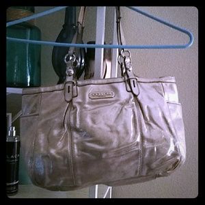 Gold coach purse